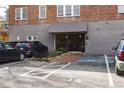 Convenient parking area with marked spaces and easy access to building entrance at 1026 Saint Charles Ne Ave # 10, Atlanta, GA 30306
