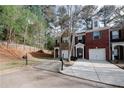 Attractive exterior featuring a well-manicured lawn and private driveway at 1290 Adcox Sq, Stone Mountain, GA 30088