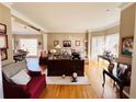 Bright living room with hardwood floors, large windows, and neutral decor at 6302 Manassas Nw Pass, Acworth, GA 30101