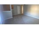 Spacious living room with new carpeting and fresh paint throughout at 6104 Cobblestone Ct, Douglasville, GA 30134