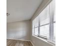 Bright living room featuring hardwood floors and large window at 3783 Brookcrest Cir, Decatur, GA 30032