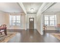 Bright and airy foyer showcasing hardwood floors, natural light, and elegant trim work at 38 Water Oak Dr, Acworth, GA 30101