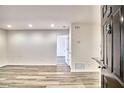 Bright living room with new floors, neutral walls, and an open doorway to another room at 2657 Lenox Ne Rd # 29-1, Atlanta, GA 30324