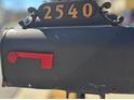 Close-up shot of a traditional black mailbox showing the house number at 2540 Willow Grove Road Nw Rd, Acworth, GA 30101