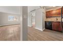 This living room has wood flooring and leads to the kitchen and other rooms at 2285 Peachtree Ne Rd # 1107, Atlanta, GA 30309