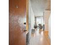 Inviting hallway leading into an open-concept living space with hardwood floors and modern design at 361 17Th Nw St # 2208, Atlanta, GA 30363