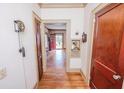 Hallway with hardwood floors and vintage decor at 970 E Main St, Canton, GA 30114