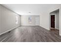 Spacious living room featuring new flooring and a light paint color at 4064 Post Rd, Winston, GA 30187