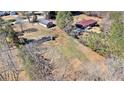 An aerial view displays the property's layout and nearby structures at 4065 Thaxton Rd, Atlanta, GA 30349