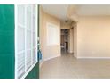 Welcoming entryway featuring tile flooring, neutral paint, and a view into the main living space at 1378 Penhurst Dr, Lawrenceville, GA 30043