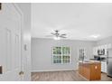 Eat-in kitchen features an island and stainless steel appliances at 1573 Eastern Sunrise Ln, Decatur, GA 30034