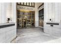 Exterior entrance to Healey Building with revolving doors and architectural details at 57 Forsyth St # 13D, Atlanta, GA 30303