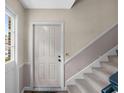 View of the front door with staircase and window to left at 747 Houston Mill Ne Rd # 1, Atlanta, GA 30329