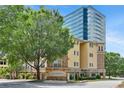 Apartment building with lush trees and a monument sign in a desirable community at 10 Perimeter Summit Ne Blvd # 2112, Atlanta, GA 30319