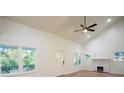 Bright and airy living room with high ceilings, modern fireplace, and large windows at 1342 Carter Rd, Decatur, GA 30030