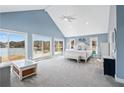 Spacious primary bedroom with large windows, views of the water, and light blue painted walls at 2387 Battle Dr, Villa Rica, GA 30180
