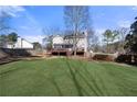 Spacious backyard featuring a large deck perfect for outdoor entertaining at 491 Lees Sw Trce, Marietta, GA 30064