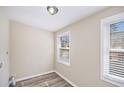 Cozy laundry room features modern flooring, neutral paint, and a bright window at 2917 1St Sw Ave, Atlanta, GA 30315