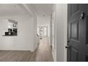 Bright entryway leading to living room, featuring hardwood floors and open layout at 400 17Th Street Nw # 1304, Atlanta, GA 30363