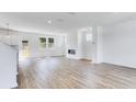 Spacious living area boasting hardwood floors and a modern fireplace at 201 Groveton Ct, Euharlee, GA 30145