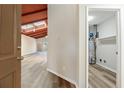 Inviting entryway with wood-look floors leading into a bright living space with vaulted ceilings at 841 Lake Hollow Sw Blvd, Marietta, GA 30064