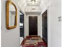 Elegant entryway features a striking dark door, and is well-lit with classic design elements at 3638 Peachtree Rd # 306, Atlanta, GA 30319