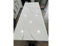 Close-up of kitchen island featuring a white countertop with marbled design at 900 Ira Sw St, Atlanta, GA 30310