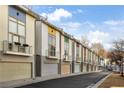 A row of modern townhomes shows architectural style, curb appeal, and neighborhood charm at 1376 Stirling Nw Cir, Atlanta, GA 30318