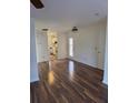 Inviting living area with gleaming floors, opening to a well-appointed kitchen area at 3133 West Point Cir, Douglasville, GA 30134