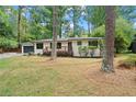 Landscaped front yard with trees providing shade to this beautiful home at 3363 Briarcliff Ne Rd, Atlanta, GA 30345