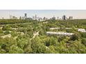 Stunning aerial view of the skyline surrounded by lush greenery at 2865 Lenox Road Ne # 602, Atlanta, GA 30324