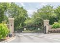 Elegant gated entrance with stone pillars, providing security and curb appeal at 2865 Lenox Road Ne # 602, Atlanta, GA 30324