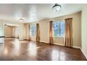 Spacious living room featuring hardwood floors and natural light at 1276 Clay Sw Rd, Mableton, GA 30126