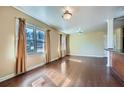 Bright living room with hardwood floors and large windows at 1276 Clay Sw Rd, Mableton, GA 30126