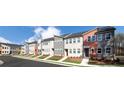 Modern townhome exteriors with colorful facades and ample windows for natural light at 1578 Driggs Nw Dr # 171, Atlanta, GA 30318