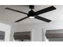 Contemporary black ceiling fan with integrated light fixture, complemented by window details at 1592 Driggs Nw Dr # 165, Atlanta, GA 30318