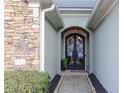 Close up of the house entrance featuring ornate ironwork doors at 2250 Snug Ne Hbr, Marietta, GA 30066