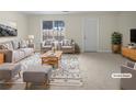 Bright living room with stylish furniture and a large window offering natural light at 3153 Kingswood Gln, Decatur, GA 30034