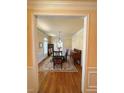 Formal dining room featuring hardwood floors, chandelier, and plenty of natural light at 2371 Bellefonte Ave # 61, Lawrenceville, GA 30043