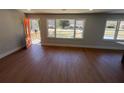 Inviting living room with wood floors and a view of the outdoors at 1368 Harbin Sw Rd, Atlanta, GA 30311