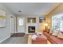 Bright living room featuring a fireplace and ample natural light at 2139 Hickory Se Bnd # E, Conyers, GA 30013