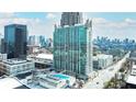 Striking high-rise condo with a pool in a vibrant urban setting, featuring panoramic city views and modern architecture at 361 17Th St # 2122, Atlanta, GA 30363
