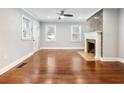 A charming living room with fireplace and gorgeous hardwood floors at 1764 Springview Nw Rd, Atlanta, GA 30314