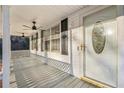 View of the covered front porch featuring a ceiling fan at 2248 Bethel Rd, Conyers, GA 30012