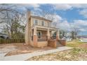 Beautiful two-story home with an open porch showcasing traditional style and inviting curb appeal at 3040 Washington Rd, Atlanta, GA 30344