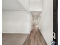 Modern entryway with wood-look flooring, neutral paint, and high ceilings at 3954 Brushy St, Powder Springs, GA 30127