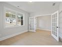 Bright home office with French doors and hardwood floors at 2723 Byess Ct, Marietta, GA 30064