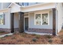 Close-up of front porch with sturdy wooden support columns at 2723 Byess Ct, Marietta, GA 30064