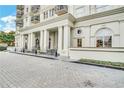 Exterior shot showcasing the stately entrance, architectural details, and well-kept landscaping at 195 14Th Ne St # Ts8, Atlanta, GA 30309