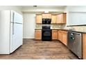 Well-lit kitchen featuring maple cabinets, granite countertops, and stainless steel appliances at 2795 Greenbridge Drive, Norcross, GA 30071